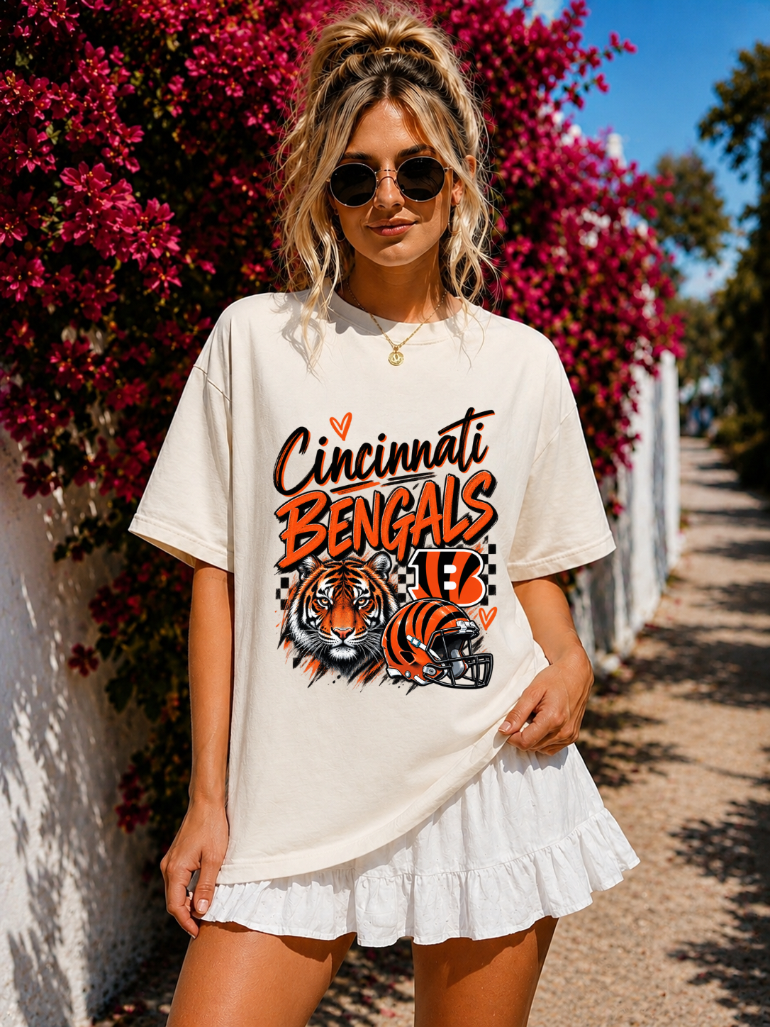 Cincinnati Bengals tiger and football helmet graphic shirt in orange, black and white