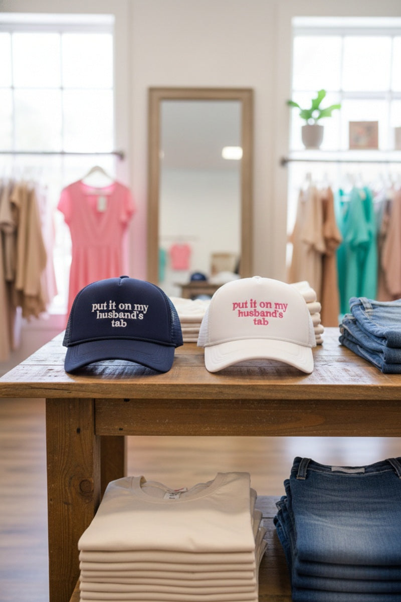 Put It On My Husband’s Tab Trucker Hat